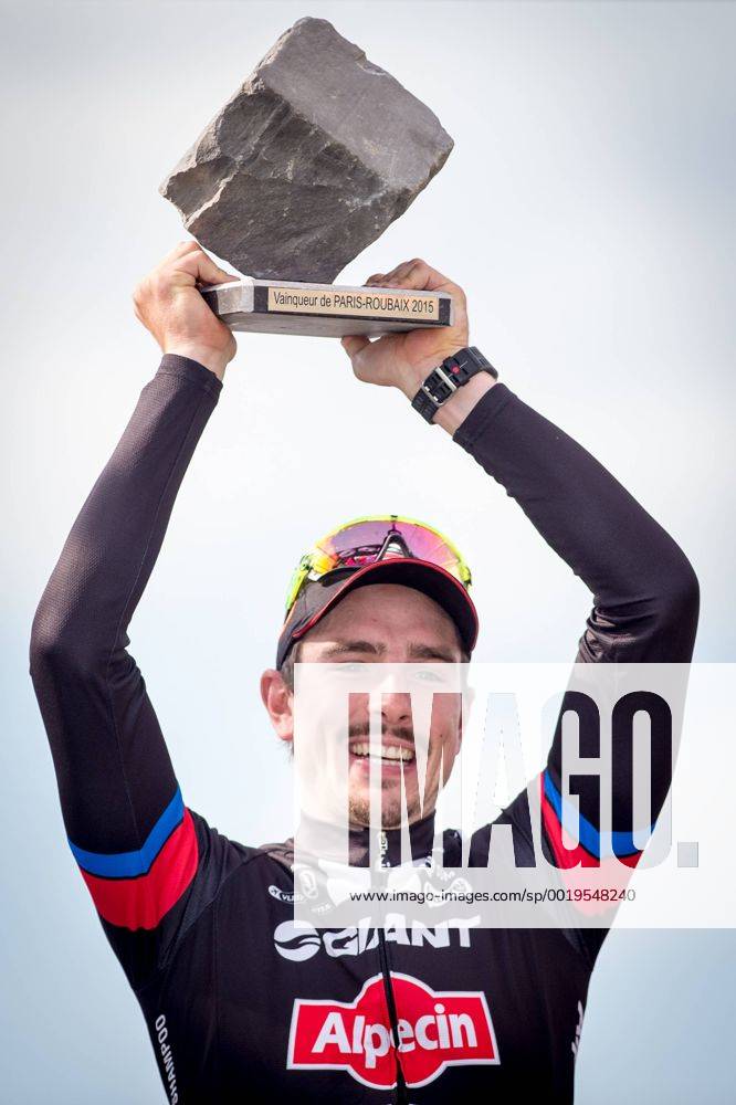 - ROUBAIX, FRANCE: German John Degenkolb of Team Giant-Alpecin celebrates on the podium after the Paris-Roubaix one day cycling race, 253,5 km from Compiegne to the Velodrome in Roubaix, Sunday 12 April 2015. LUCxCLAESSEN x04603269x
