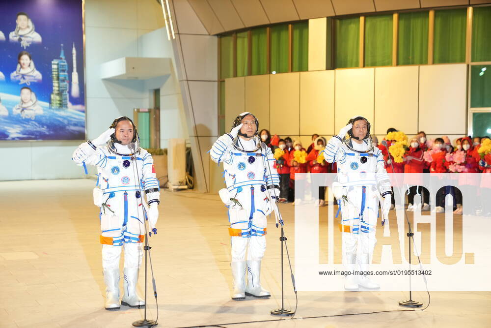 (221129) -- JIUQUAN, Nov. 29, 2022 -- A see-off ceremony for three Chinese astronauts of the Shenzhou-15 manned space mission is held at the Jiuquan Satellite Launch Center in northwest China, Nov. 29, 2022. Astronauts Fei Junlong (C), Deng Qingming (R), and Zhang Lu have received years of arduous training for this six-month mission, during which the construction of China s space station will be officially completed. ) CHINA-JIUQUAN-SHENZHOU-15-ASTRONAUTS-SEE-OFF CEREMONY (CN) LixGang