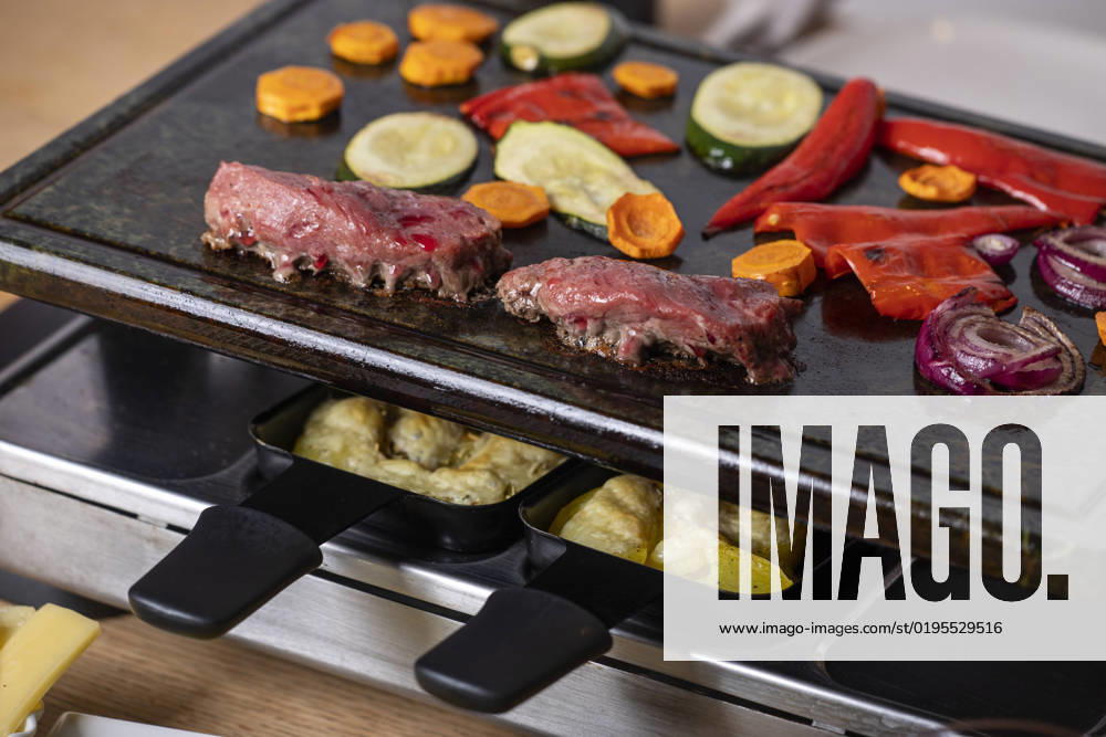 Swiss Raclette with Meat and Vegetables 1035310179