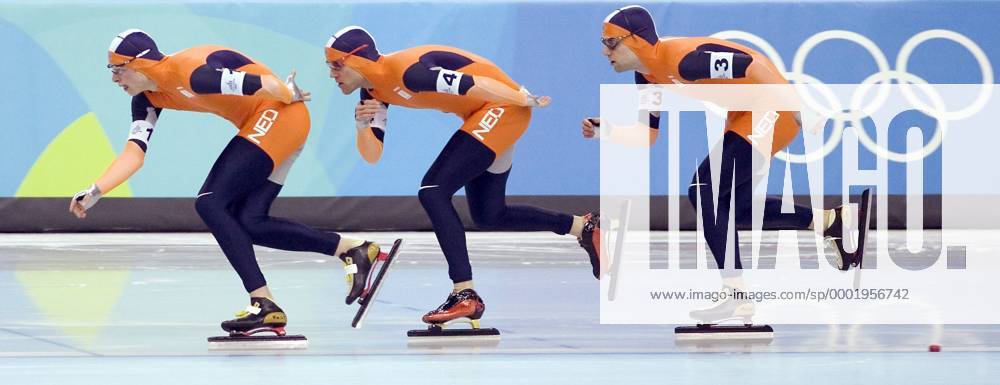 Die niederländische Mannschaft auf der Bahn, v.li.: Sven Kramer, Carl Verheijen und Mark Tuitert - Eisschnellauf OS Winter Herren Olympische Spiele Turin 2006, Winterspiele, Verfolgung, Teamverfolgung, Teamwettbewerb, Teamwertung Gruppe Turin Dynamik,