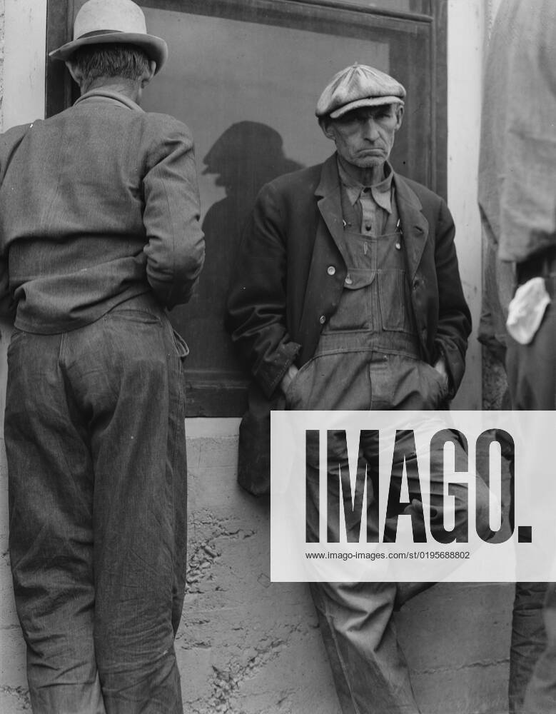 Waiting for the semimonthly relief checks at Calipatria, Imperial Valley, California, 1937. Creator: Dorothea Lange.