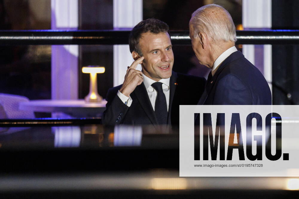 United States President Joe Biden and French President Emmanuel Macron depart after dining at the restaurant Fiola Mare, in Washington, DC, US, on Wednesday, Nov. 30, 2022. Biden will welcome French President Macron for the first White House state dinner in more than three years on Thursday, setting aside recent tensions with Paris over defense and trade issues to celebrate the oldest US alliance Washington USA - ZUMAs152 20221130_zaa_s152_223