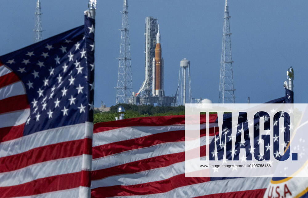 Artemis 1 is framed by American Flags as it sits on the Launch Pad 39B on August 30, 2022, shortly before it was announced that NASA plans to launch the moon mission on Saturday, September 3, 2022, at Kennedy Space Center, Florida. The mission was scrubbed on Monday due to an engine issue. NASA s SLS rocket with the Orion capsule atop is the first step for the United States to send astronauts back to the moon after 50 years. POY2022NF027 PatxBenic