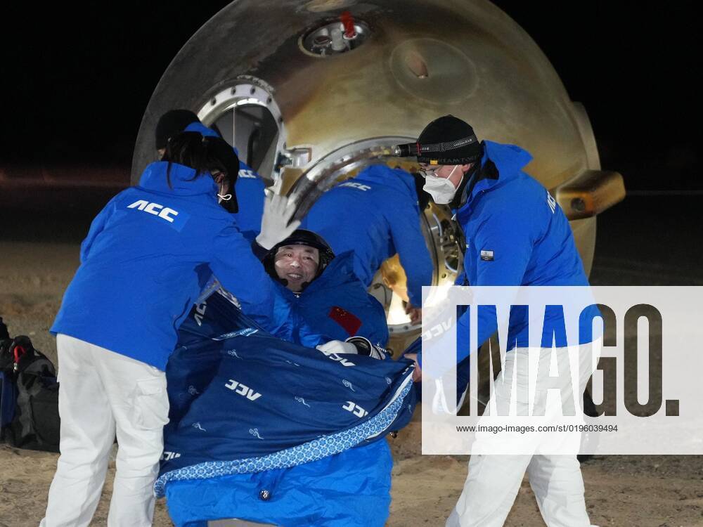 (221204) -- DONGFENG LANDING SITE, Dec. 4, 2022 -- Astronaut Cai Xuzhe is out of the return capsule of the Shenzhou-14 manned spaceship at the Dongfeng landing site in north China s Inner Mongolia Autonomous Region, Dec. 4, 2022. The return capsule of the Shenzhou-14 manned spaceship, carrying astronauts Chen Dong, Liu Yang and Cai Xuzhe, touched down at the Dongfeng landing site safely on Sunday. ) (EyesonSci)CHINA-SHENZHOU-14-RETURN (CN) LixGang