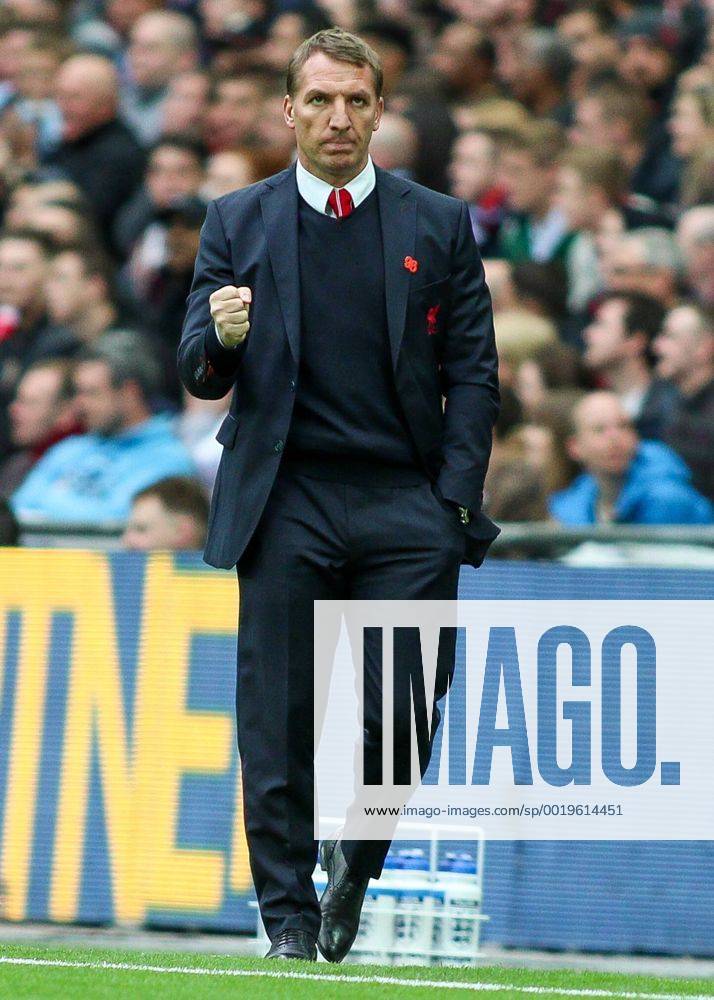 Football - 2014 2015 - FA Cup Semi Final, - Aston Villa Vs Liverpool, Liverpool s Manager Brendan Rodgers with a clenched fist in celebration at Wembley Stadium COLORSPORT DANIEL BEARHAM AST_LIV