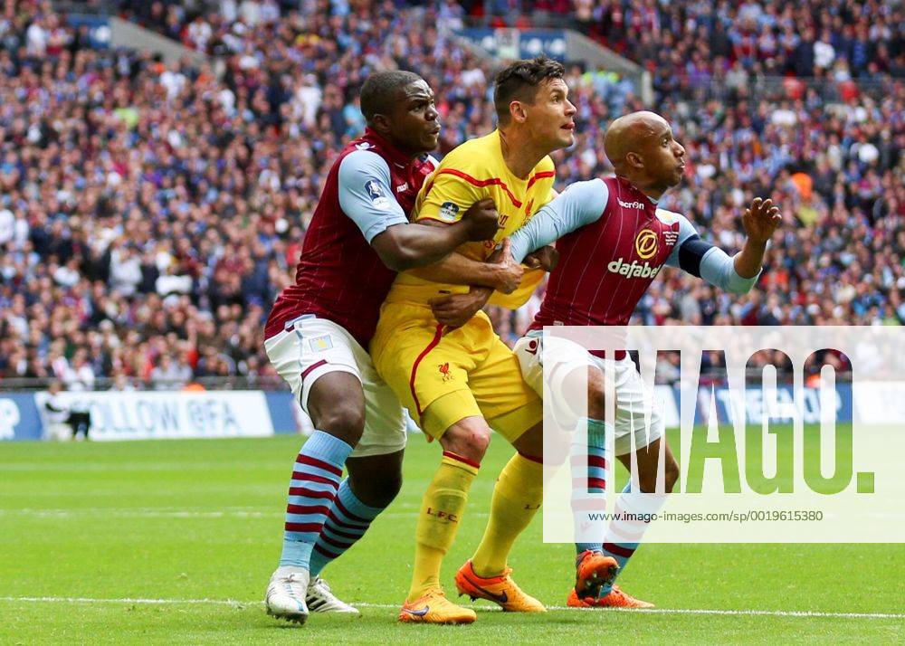 Football - 2014 2015 - FA Cup Semi Final, - Aston Villa Vs Liverpool, Aston Villa palyers double team on Liverpool s Dejan Lovren to defend a corner at Wembley Stadium COLORSPORT DANIEL BEARHAM AST_LIV