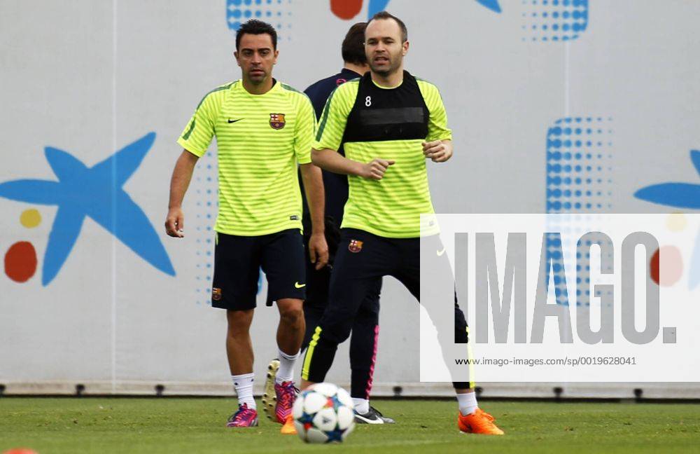 Barcelona - UEFA Champions League 2014 2015 - Training FC Barcelona - Andres Iniesta and Xavi Hernandez -