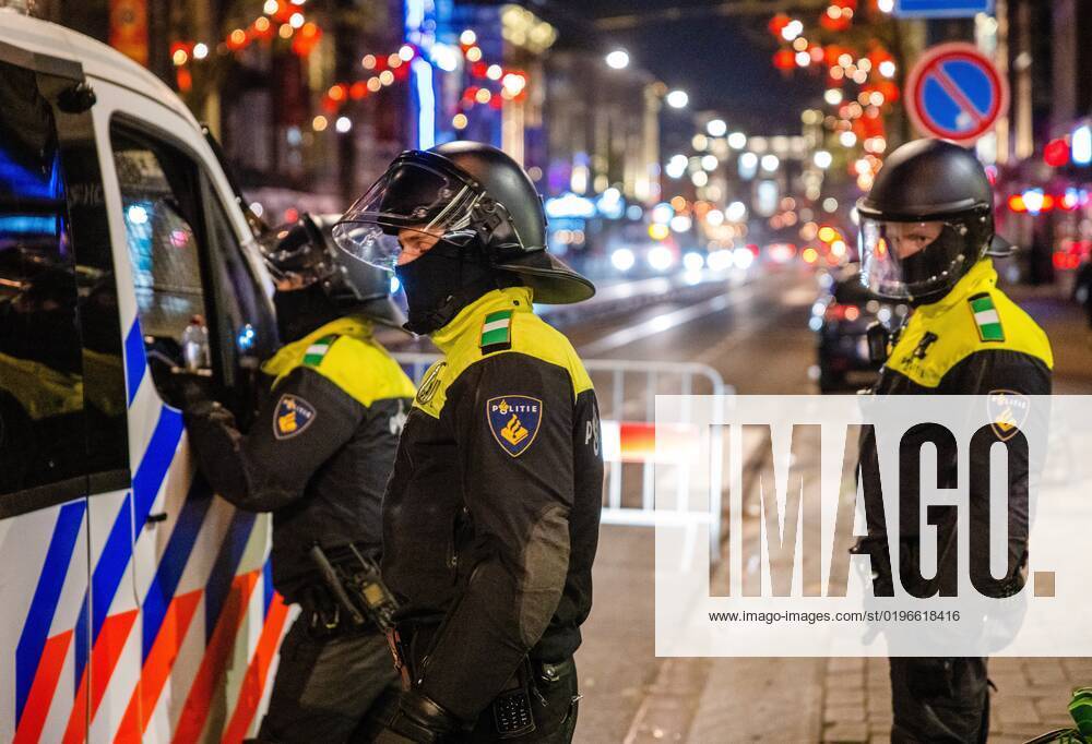 ROTTERDAM Young people are being sent away from the Kruisplein by the riot police after the lost semi final match between Morocco and France at the World Cup football in Qatar ANP JEFFREY GROENEWEG netherlands out belgium out