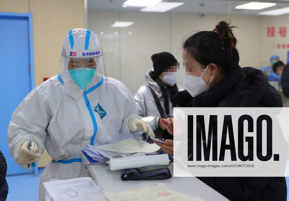 (221217) -- SHENYANG, Dec. 17, 2022 -- A medical worker works at a fever clinic at Shengjing Hospital of China Medical University in Shenyang, northeast China s Liaoning Province, Dec. 15, 2022. China is continuing its optimization of COVID-19 epidemic prevention and control measures as it shifts the focus of its response strategy from curbing new infections to preventing and treating severe cases. The fever clinic of the hospital is trying its best to ensure the treatment of patients with acute and severe symptoms. ) CHINA-LIAONING-SHENYANG-FEVER CLINIC (CN) YangxQing