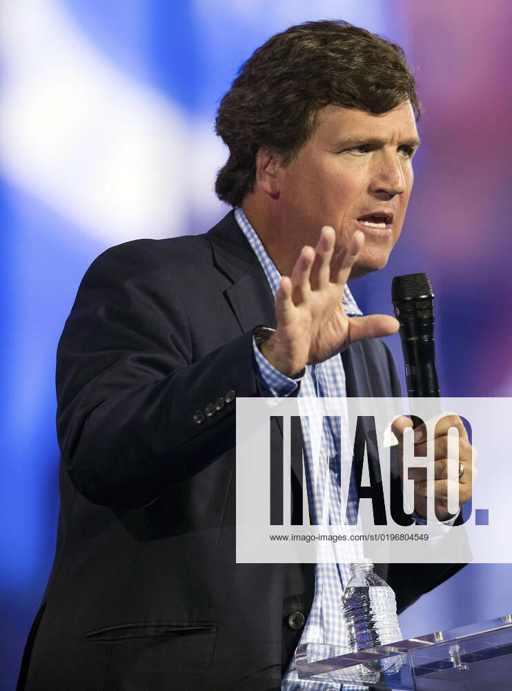 Phoenix, Arizona, USA - Fox News host TUCKER CARLSON speaks at Turning Point USA s AmericaFest 2022. Phoenix USA - ZUMAce6_ 20221217_zaf_ce6_004