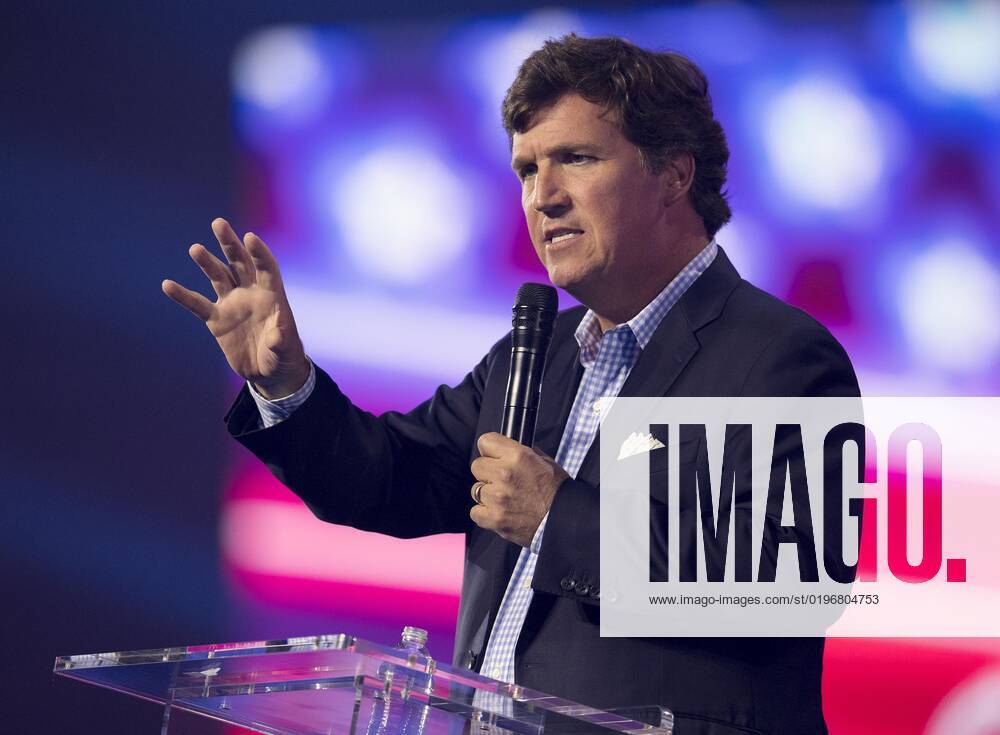 Phoenix, Arizona, USA - Fox News host TUCKER CARLSON speaks at Turning Point USA s AmericaFest 2022. Phoenix USA - ZUMAce6_ 20221217_zaf_ce6_013