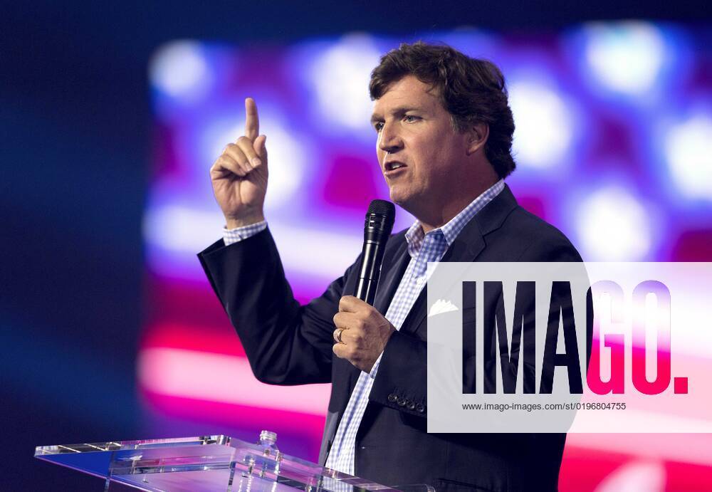 Phoenix, Arizona, USA - Fox News host TUCKER CARLSON speaks at Turning Point USA s AmericaFest 2022. Phoenix USA - ZUMAce6_ 20221217_zaf_ce6_015