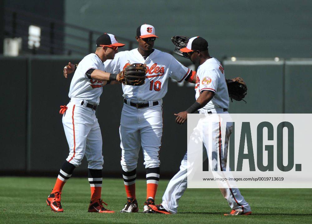Baltimore Orioles outfielders Adam Jones (10) Delmon Young (R) and Alejandro De Aza hug after the Orioles 8-2 win over the Chicago White Sox at Orioles Park at Camden Yards in Baltimore, Maryland on April 29, 2015. For the first time in Major League Baseball s history fans were not allowed to the game because of the ongoing civil unrest and protest in Baltimore in the wake of Freddie Gray s death. The late 25-year-old died earlier this month from a spinal injury while in police custody. BAL20150429329 KEVINxDIETSCH