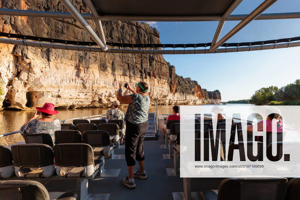 BUNUBA RANGERS, Tourists are seen on a boat trip to see the Danggu Geikie Gorge National Park on the Fitzroy River near Fitzroy Crossing in the Kimberley region of Western Australia on Saturday, October 15, 2022. Bunuba Aboriginal people are the traditional owners and are joint park managers. The Bunuba Rangers, based in Fitzroy Crossing, are an independent group established by the Bunuba Dawangarri Aboriginal Corporation (BDAC) to help manage significant central west Kimberley conservation reserves established on Bunuba country.( NO ARCHIVING, , NO USE IN BOOKS WITHOUT CONSENT WA AUSTRALIA
