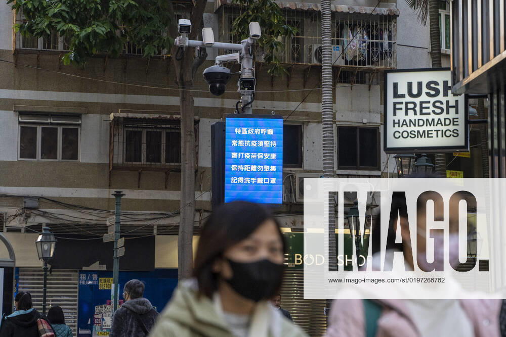 Daily Life In Macau People wearing face masks in front of a dozen of CCTV Camera on December 29, 2022 in Macau, China. Macau Macau