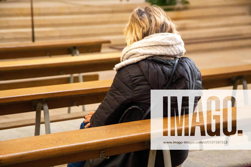 Symbol image young woman in church