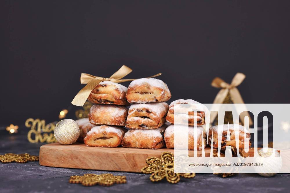 German Stollen, a Fruit bread with nuts, Spices and dried Fruit with Powdered sugar, the traditional to Christmas time served will