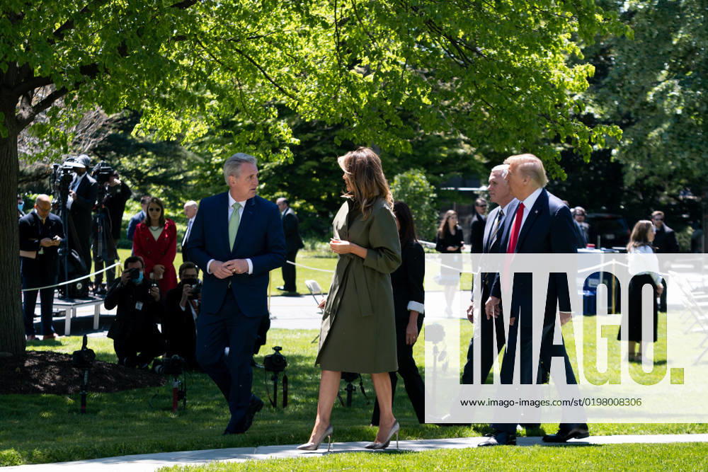 President Donald J. Trump, First Lady Melania Trump, Vice President Mike Pence, and Second Lady Karen Pence walk with House Minority Leader Rep. Kevin McCarthy, R-Calif., after participating in a tree planting ceremony in honor of Earth Day and Arbor Day Wednesday, April 22, 2020, on the South Lawn of the White House...People: President Donald Trump, Rep. Kevin McCarthy. Washington United States Of America - ZUMAs214 20200422_zaa_s214_035