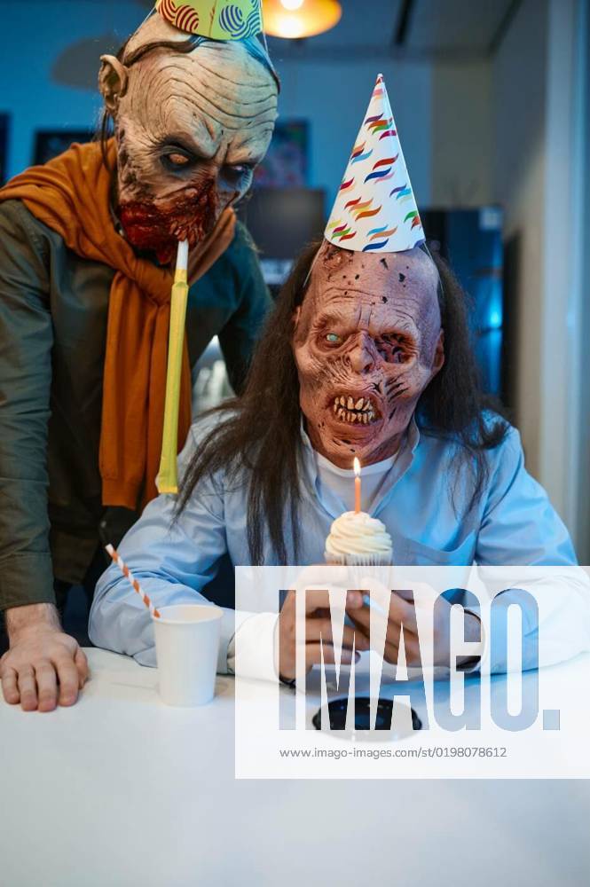 Zombie employees congratulate colleague with birthday, Happy creepy zombie employees in festive cap congratulating his colleague with birthday party during lunch time in office, Happy creepy zombie employees in festive cap congratulating his colleague with birthday party during lunch time in office, 05.10.2022,