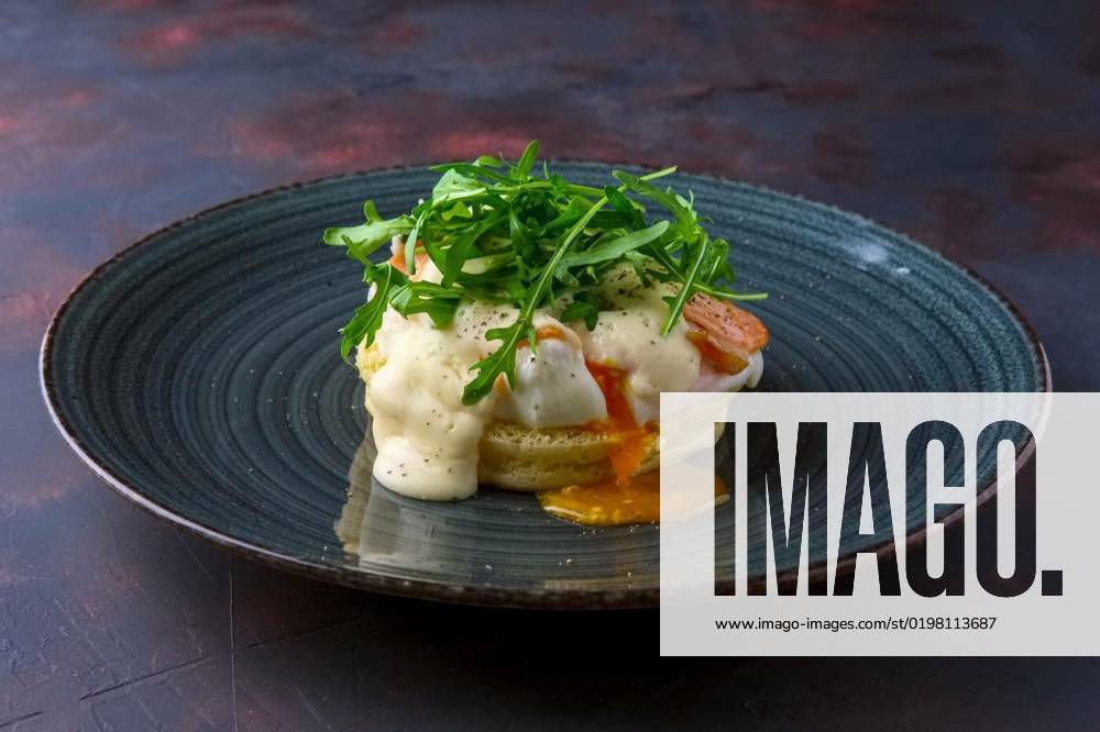Sandwich with poached egg, smoked salmon and cheese decorated with arugula, Sandwich with poached egg, smoked salmon and cheese decorated with arugula, Sandwich with poached egg, smoked salmon and cheese decorated with arugula, 09.10.2022,