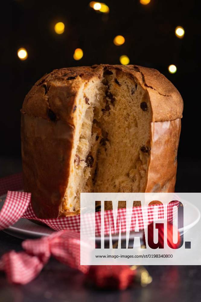 Panettone Christmas Cake. Italian sweet bread on plate on dark table., Panettone Christmas Cake. Italian sweet bread on plate on the dark table., Panettone Christmas Cake. Italian sweet bread on plate on the dark table., 07.11.2022,