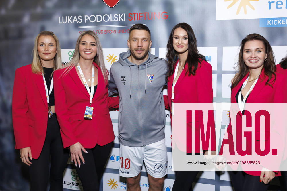 Soccer Lukas Podolski with models at schauinsland reisen Cup 2023 in Schwalbe Arena Gummersbach, 08 01 2023 NRW Germany
