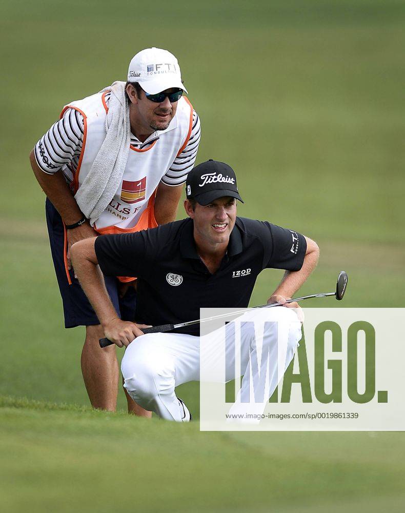 Charlotte, NC, USA - Webb Simpson and his caddie line up a putt on the 14th green during the second round of the Wells Fargo Championship at Quail Hollow Club on Friday, May 15, 2015, in Charlotte, N.C. Wells Fargo Second Round - ZUMAm67_