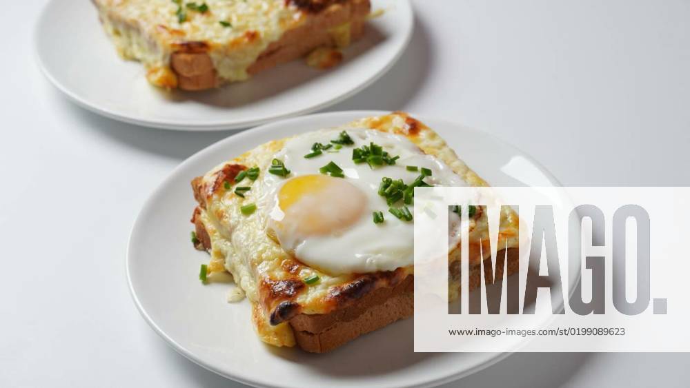Hot French Traditional Croque madame and croque monsieur sandwiches for breakfast. Melted cheese and a fried egg, Hot French Traditional Croque madame and croque monsieur sandwiches for breakfast. Melted cheese and a fried egg, Hot French Traditional Croque madame and croque monsieur sandwiches for breakfast. Melted cheese and a fried egg, 17.12.2022,