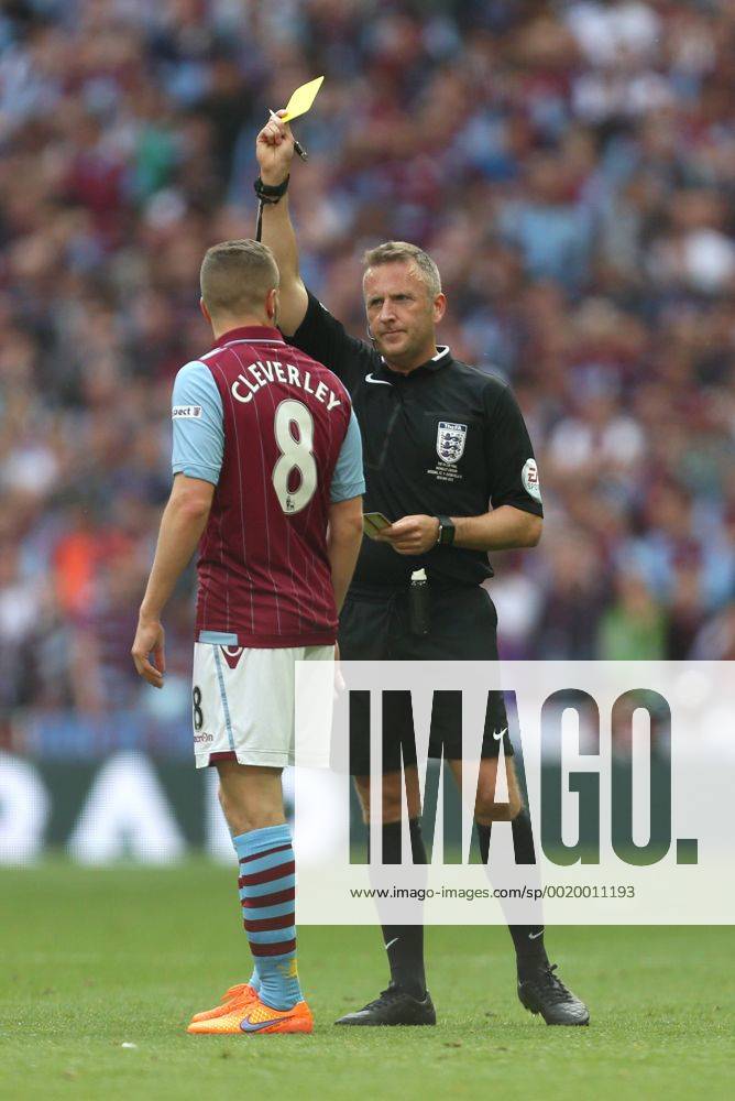Tom Cleverley of Aston Villa earns a yellow card for his tackle on Arsenal s Nacho Monreal - Arsenal vs. Aston Villa - FA Cup Final - Wembley Stadium - London - 30 05 2015 Pic Philip Oldham Sportimage .