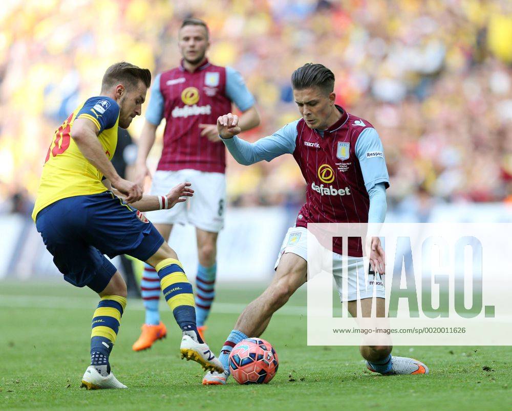 Arsenal s Aaron Ramsey tussles with Aston Villa s Jack Grealish FA Cup Final - Arsenal vs Aston Villa - Wembley Stadium - England - 30th May 2015 - Picture David Klein Sportimage .