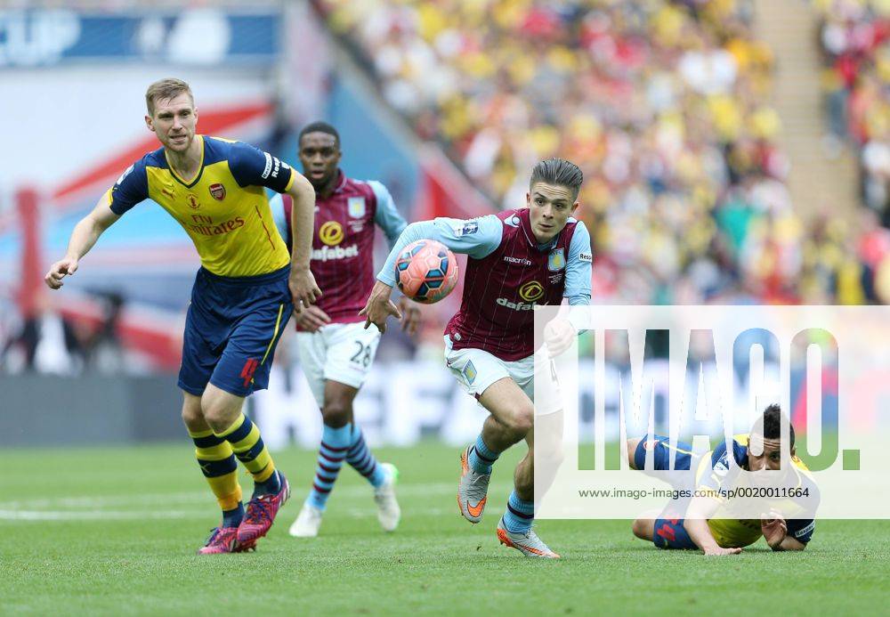 Arsenal s Per Mertesacker tussles with Aston Villa s Jack Grealish FA Cup Final - Arsenal vs Aston Villa - Wembley Stadium - England - 30th May 2015 - Picture David Klein Sportimage .