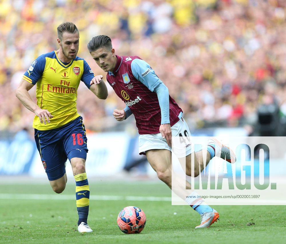 Arsenal s Aaron Ramsey tussles with Aston Villa s Jack Grealish FA Cup Final - Arsenal vs Aston Villa - Wembley Stadium - England - 30th May 2015 - Picture David Klein Sportimage .