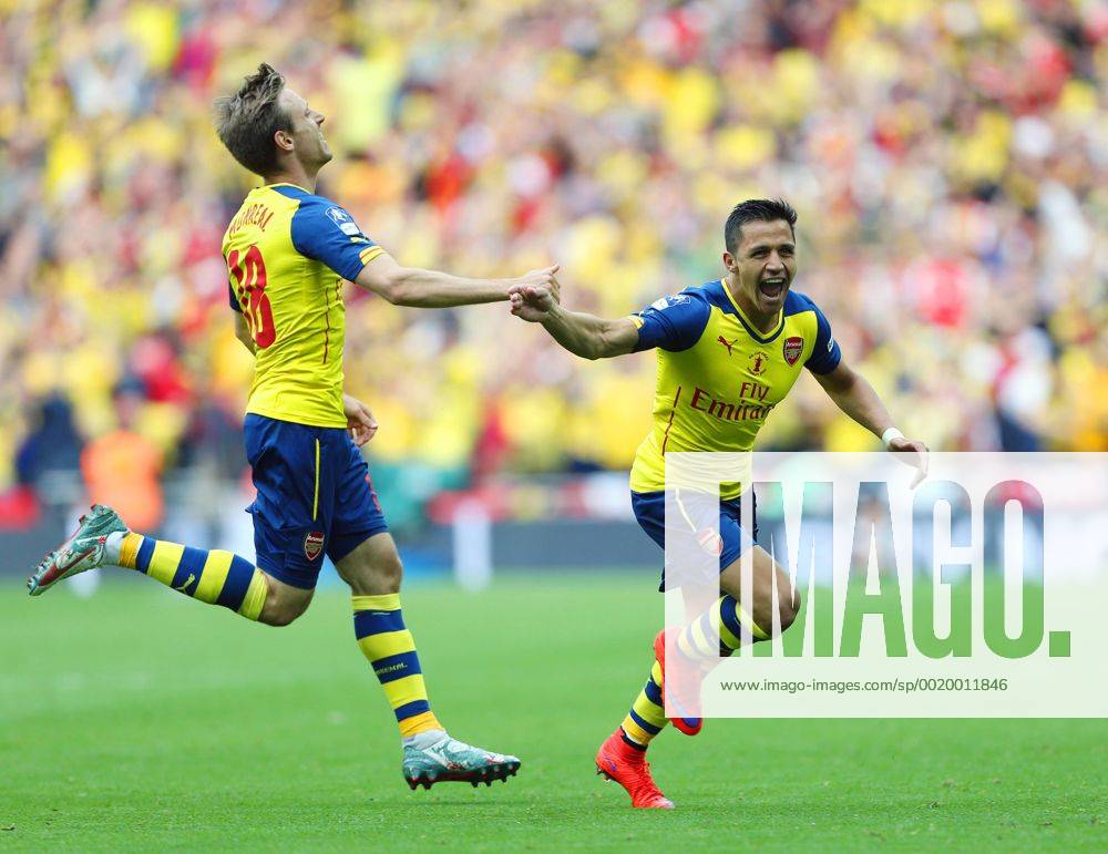 Arsenal s Alexis Sanchez celebrates scoring his sides second goal FA Cup Final - Arsenal vs Aston Villa - Wembley Stadium - England - 30th May 2015 - Picture David Klein Sportimage .