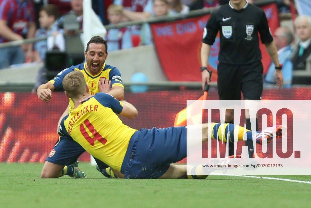 Arsenal s Per Mertesacker celebrates scoring his sides third goal - Arsenal vs. Aston Villa - FA Cup Final - Wembley Stadium - London - 30 05 2015 Pic Philip Oldham Sportimage .