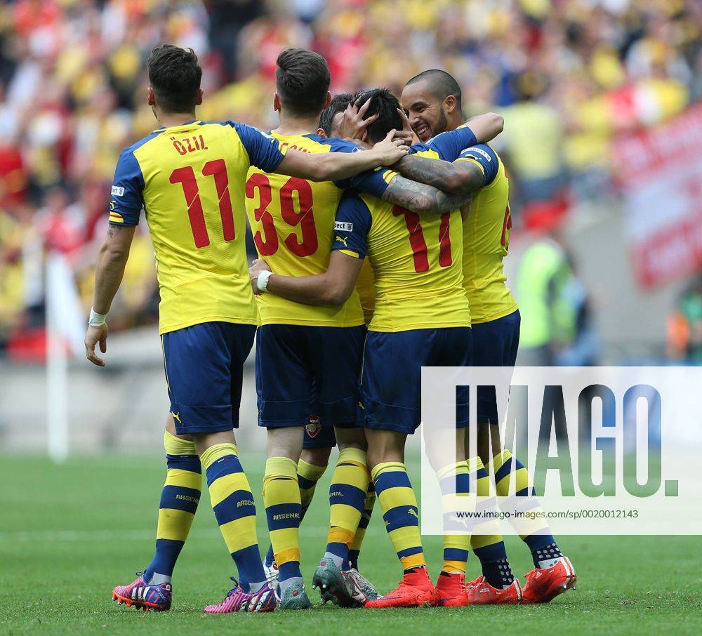 Arsenal s Alexis Sanchez celebrates scoring the second goal with first goal score Theo Walcott FA Cup Final - Arsenal vs Aston Villa - Wembley Stadium - England - 30th May 2015 - Picture David Klein Sportimage .
