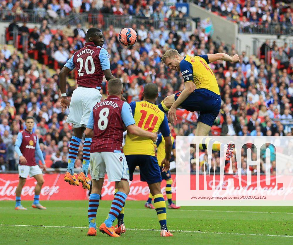 Arsenal s Per Mertesacker scoring his sides third goal FA Cup Final - Arsenal vs Aston Villa - Wembley Stadium - England - 30th May 2015 - Picture David Klein Sportimage .