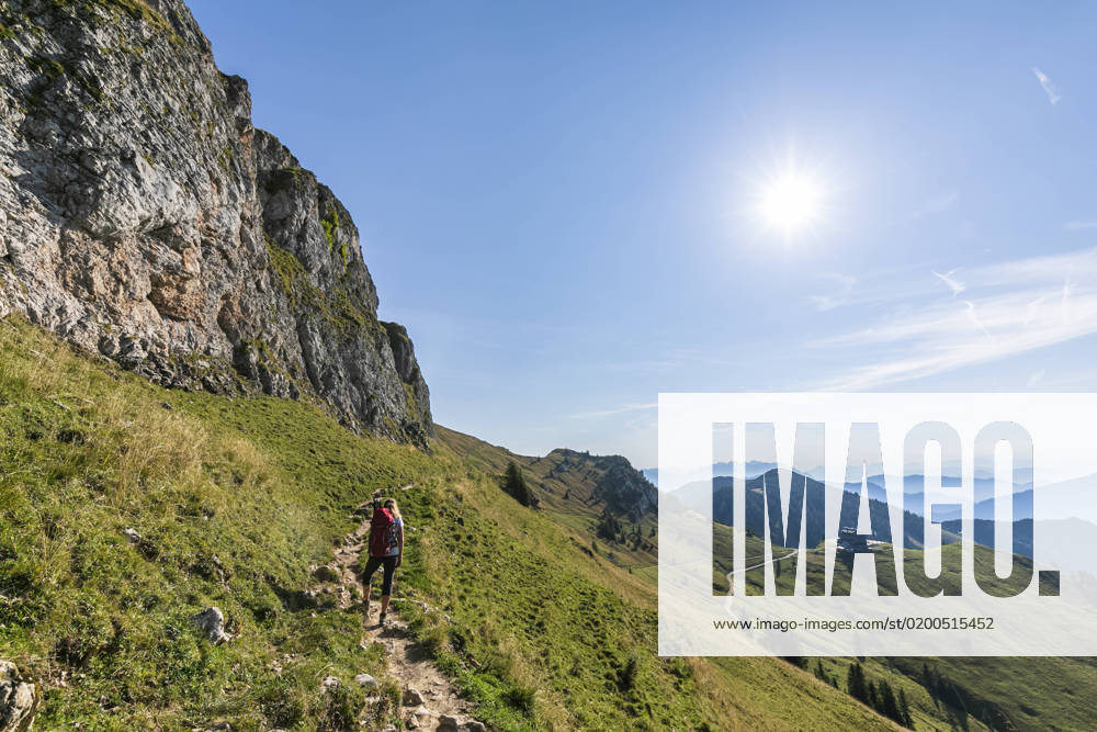 Germany, Bavaria, Sun shining over female hiker following trail to summit of Rotwand mountain model released, Symbolfoto, FOF13263