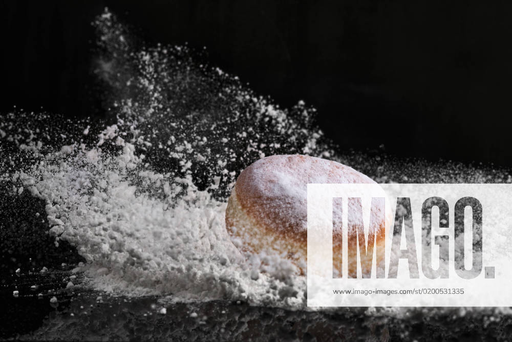 Berliner donut with jam stuffed falls into flour on black background. , 33619934.jpg, donut, food, berliner, closeup, delicious, dessert, sweet, german, sugar, baked, cake, pastry, carnival, jam, bakery, breakfast, powdered sugar, party, traditional, tasty, holiday, tradition, new year, photography, government, expertise, eat, jelly, sweet food, biscuit, celebration, silvester, snack, doughnut, round, flour, falls