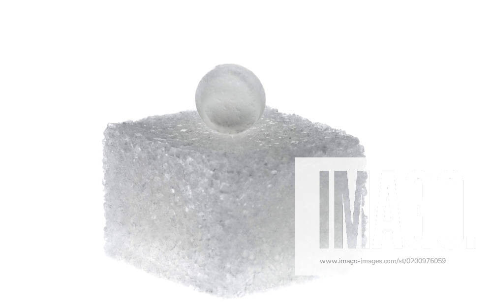 Sweetener at a sugar cube, symbol for Diaet and Calories Artificial sweetener ON a Sugar cube, symbol of Diet and Calories BLWS679182