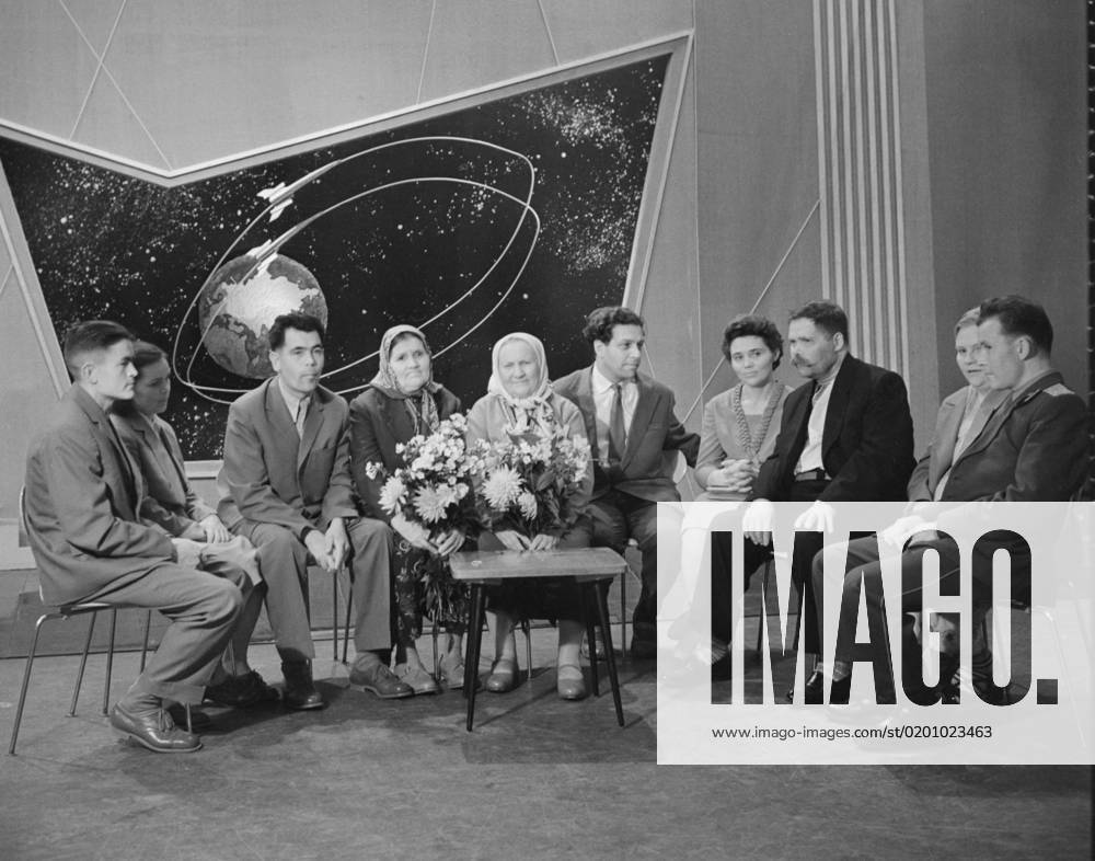 Moscow, USSR. The family of Soviet cosmonaut Andrian Nikolayev: brother Pyotr, sister Zinaida, brother Ivan and mother Anna (L-R) and the family of Soviet cosmonaut Pavel Popovich: mother Feodosia (5th L), brother Pyotr, sister Maria, father Roman and wife Marina (R-L) come to watch the reporting on the landing and welcoming of the cosmonauts who performed the first joint multi-day spaceflight in the history of cosmonautics on Vostok 3 and Vostok 4 spacecraft, and to appear in a TV show hosted by radio and news presenter Yuri Galperin (5th R) in a studio of the Central Television. Vyacheslav Un Da-Sin TASS 32395879