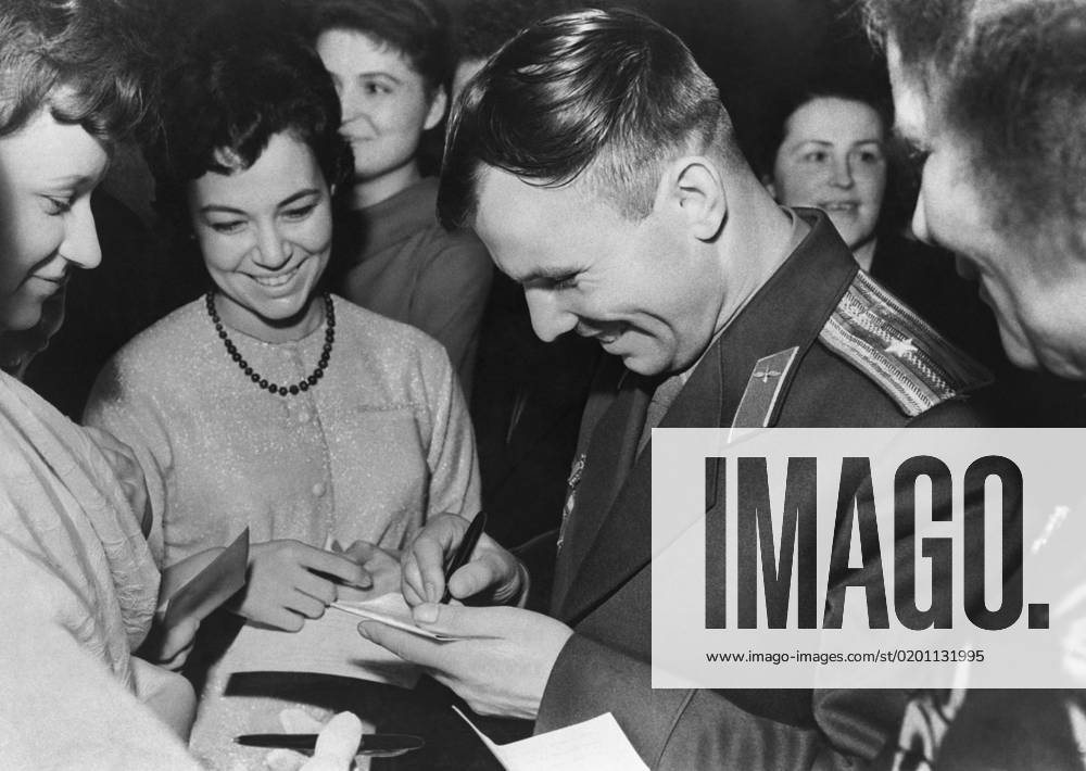Moscow, USSR. Soviet cosmonaut, the first person in the world to make an orbital flight on the Vostok spacecraft on April 12, 1961 Yuri Gagarin signs autographs before the reception in the Kremlin dedicated to the successful completion of his space flight. Vladimir Savostyanov TASS 1452144