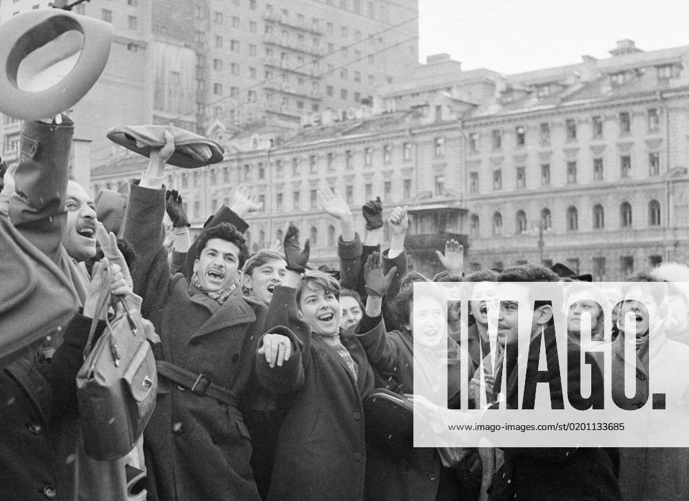 Moscow. The USSR. April 12, 1961. Muscovites listen to a radio message about a successful flight of Yuri Gagarin, the first human to journey into outer space on Revolution Square. Nikolay Kuleshov TASS 158363