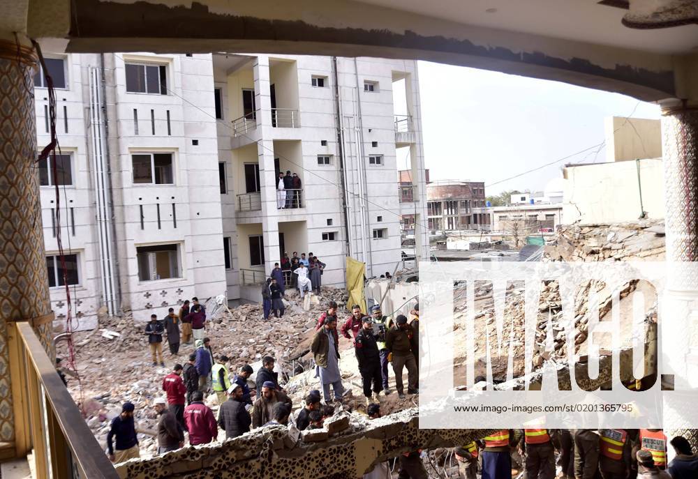 (230131) -- PESHAWAR, Jan. 31, 2023 -- Rescuers and security personnel inspect the blast site in northwest Pakistan s Peshawar on Jan. 31, 2023. Death toll of Monday s suicide blast in a mosque in Pakistan s northwest Khyber Pakhtunkhwa province has risen to 100 on Tuesday with over 200 others injured, hospital sources said. (Photo by Xinhua) PAKISTAN-PESHAWAR-BLAST-DEATH TOLL SaeedxAhmad