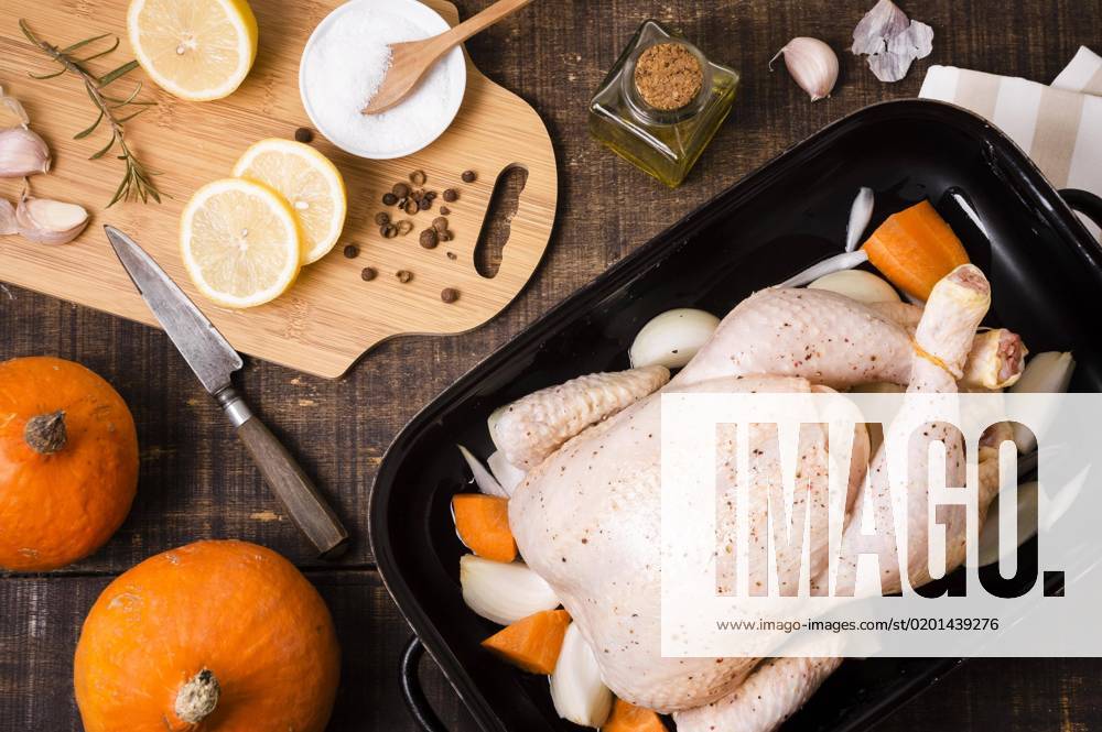 Top view chicken pan with lemon slices thanksgiving top view chicken pan with lemon slices thanksgiving
