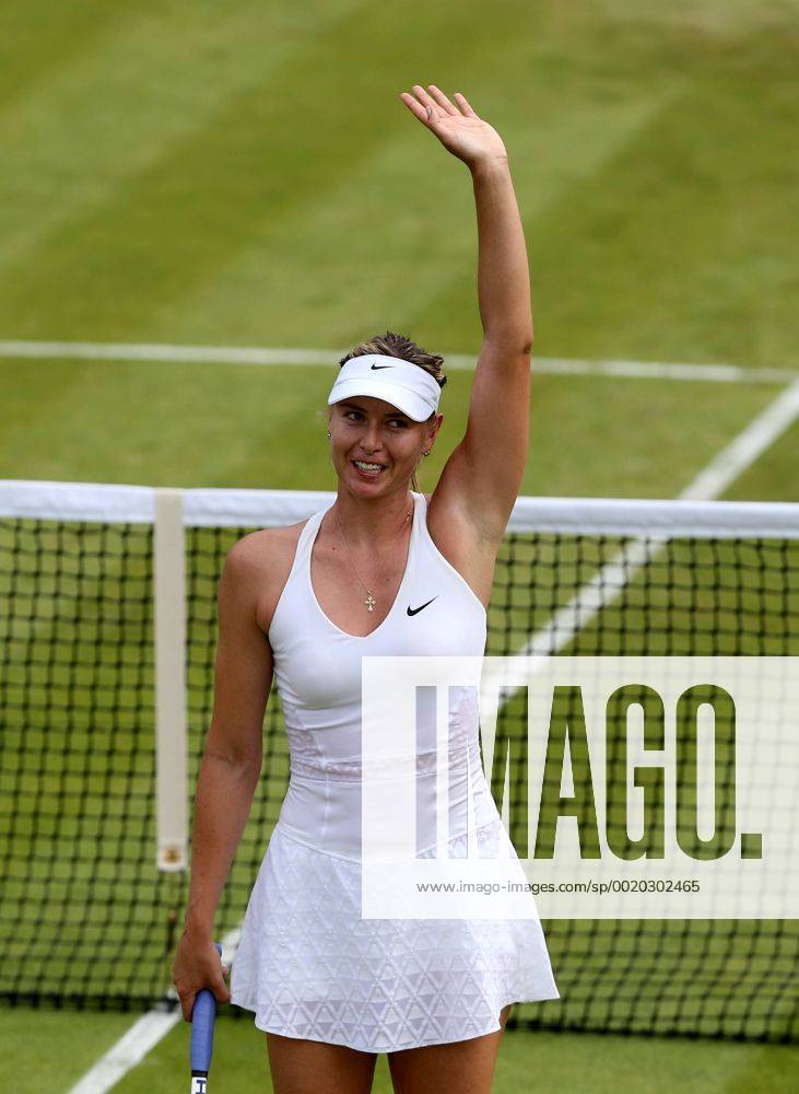 (150702) -- LONDON, Maria Sharapova of Russia waves to audience after beating Richel Hogenkamp of the Netherlands during the women s singles second round match at 2015 Wimbledon Tennis Championships in London, Britain, July 1, 2015. Sharapova won 2-0. ) (SP)BRITAIN-LONDON-TENNIS-WIMBLEDON CHAMPIONSHIPS HanxYan