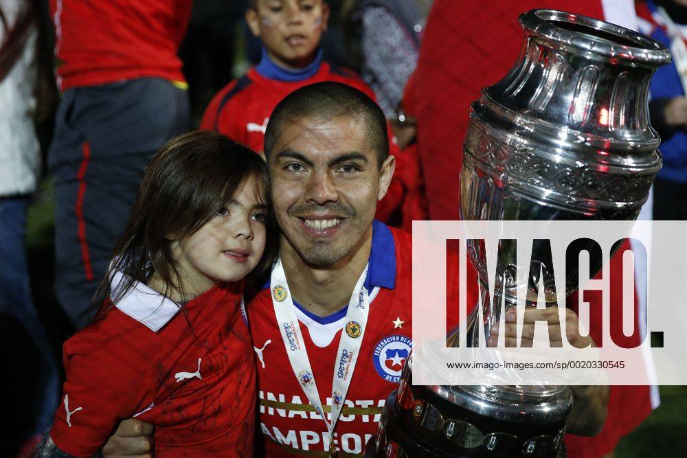 Football, Chile v Argentina. Copa America 2015 . Chile s player, Francisco Silva, lifts the cup after winning the Copa America 2015 in a football match against Argentina at the Nacional stadium in Santiago, Chile. 04 07 2015 Andres Pina Photosport Chile v Argentina, Copa America 2015.