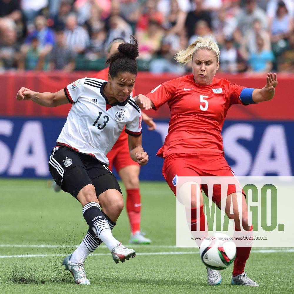 (150705) -- EDMONTON, July 5, 2015 -- Celia Sasic (L) of Germany shoots during the third place match of the FIFA 2015 Women s World Cup against England at Commonwealth Stadium, in Edmonton, Canada, on July 4, 2015. England defeated Germany 1-0 in extra time and won the third place of the FIFA 2015 Women s World Cup. ) (SP)CANADA-VANCOUVER-FIFA WOMEN S WORLD CUP-THIRD PLACE WangxYuguo