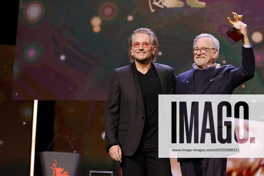U2 singer Bono and award winner Steven Spielberg on stage at the Golden Honorary Baer Gala ceremony at the 73 Berlinale International Film Festival on 21 02 2023 in Berlin Berlinale 2023 Golden Honorary Baer Gala for Steven Spielberg