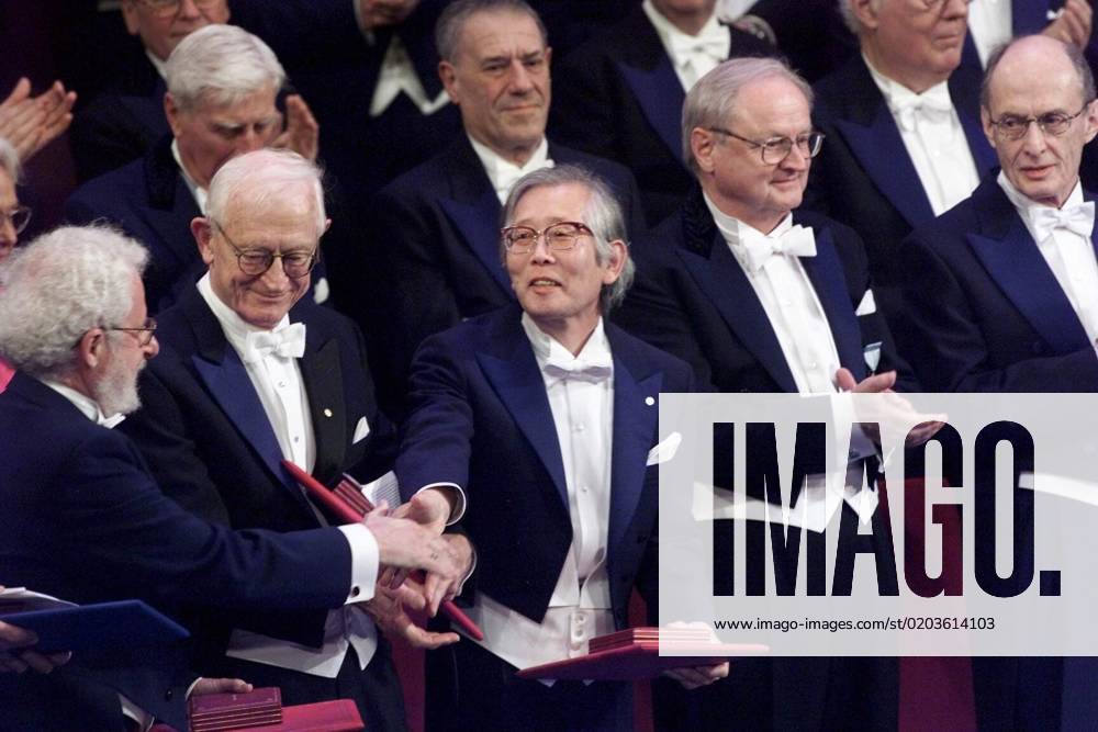 STOCKHOLM 20001210 Professor Hideki Shirakawa, centre, receives congratulations at the Nobel Prize ceremony at the Concert Hall, 10 December 2000 STOCKHOLM SWEDEN
