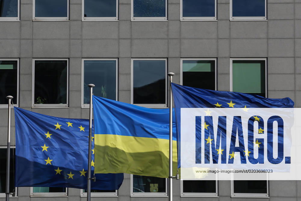 European and Ukrainian flags float outside the European Commission headquarters in occasion of the one-year anniversary of Russia s invasion of Ukraine in Brussels, Belgium, February 25, 2023. Brussels Belgium - ZUMAm177 20230225_zip_m177_016